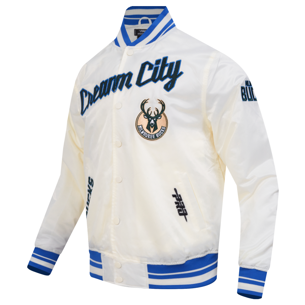 NBA MILWAUKEE BUCKS CITY EDITION 25-26 MEN'S PRO SATIN YD RIB JACKET (EGGSHELL/ ROYAL BLUE)