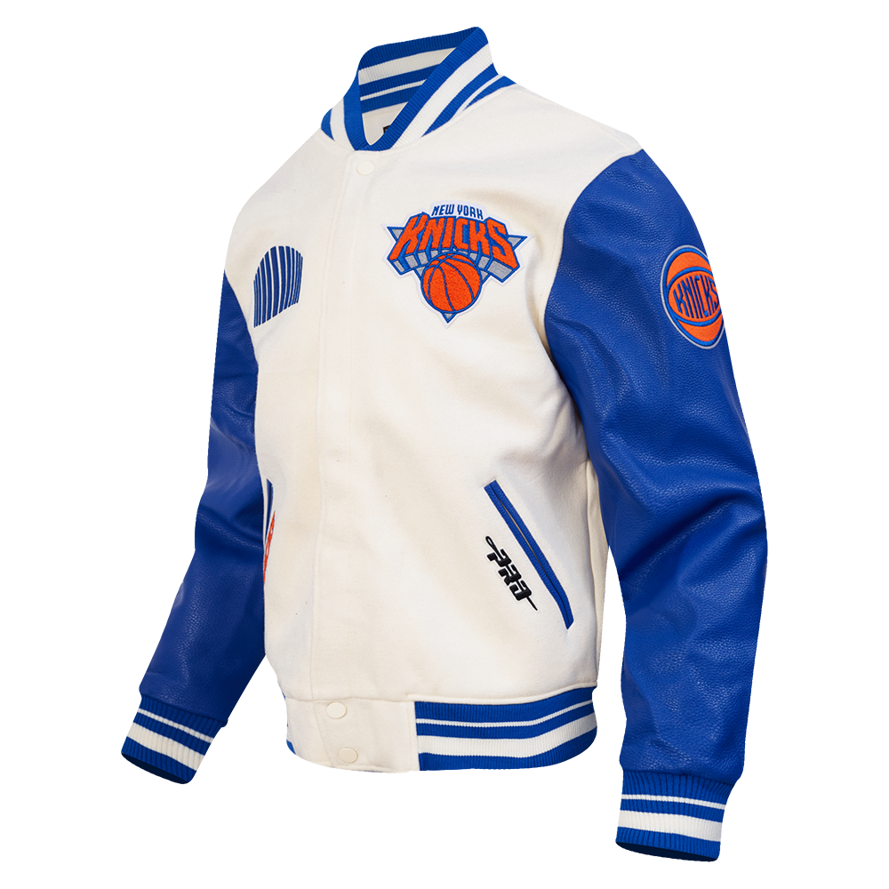 NBA NEW YORK KNICKS CITY EDITION 25-26 MEN'S RIB WOOL VARSITY JACKET (EGGSHELL/ROYAL BLUE)