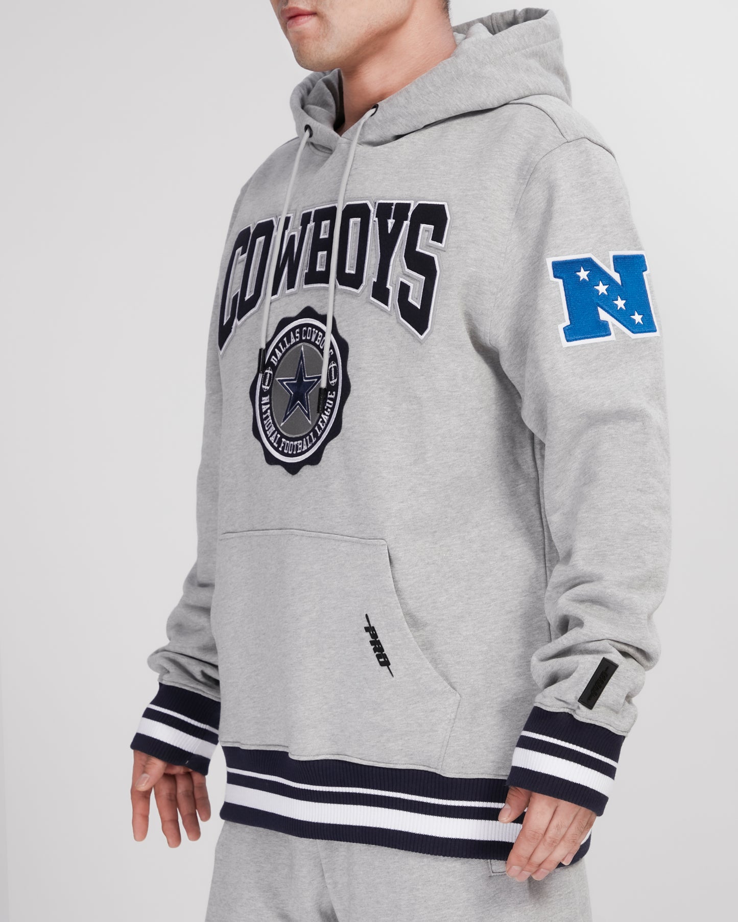 NFL DALLAS COWBOYS CREST EMBLEM RIB FLC PO HOODIE (HEATHER GREY/MIDNIGHT NAVY)