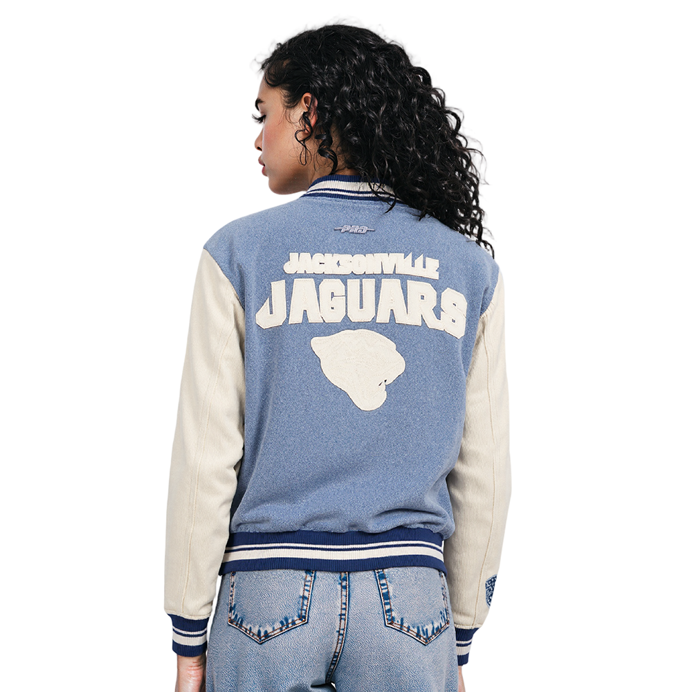 NFL JACKSONVILLE JAGUARS VARSITY BLUES WOMEN'S DENIM VARSITY JACKET (DENIM/LINEN)