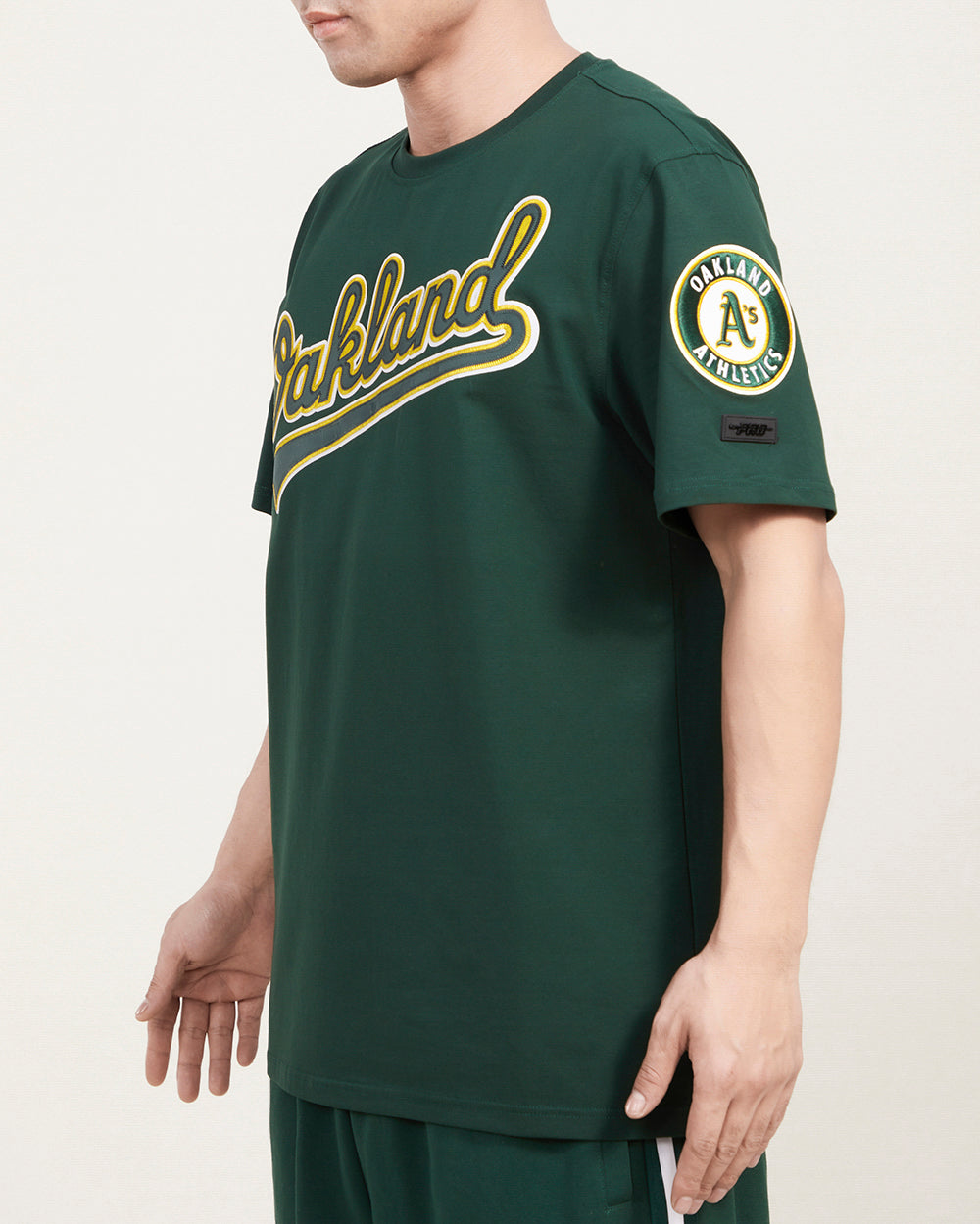 OAKLAND ATHLETICS TACKLE TWILL SJ TEE (FOREST GREEN) – Pro Standard